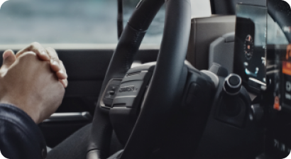 A man in a GM EV ready to take it out for a ride for the first time