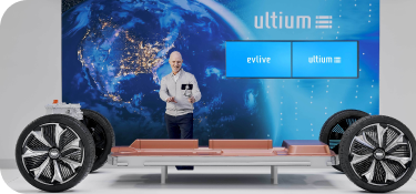 EV Live Product Specialist holding a selfie stick in studio, conducting a tour while discussing the Ultium platform.